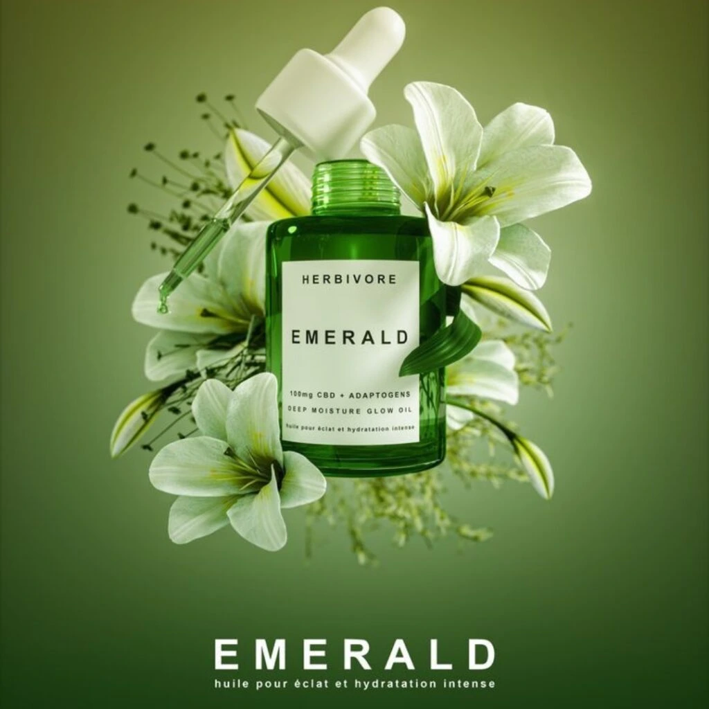 Emerald face serum bottle with natural elements – promoted by the best digital marketing agency Pulse Bit